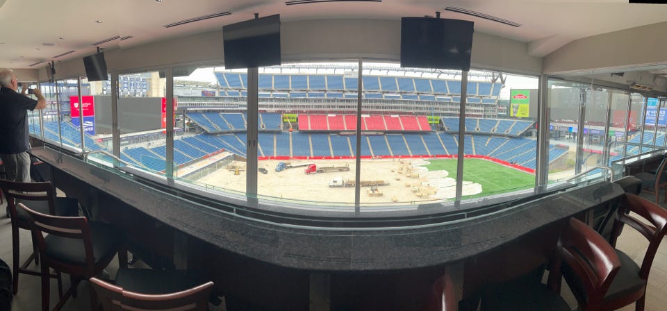 A panoramic view from a suite at Gillette Stadium as we help set-up the green screen for player introductions.