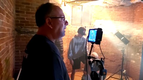 Mike Savino directing on set